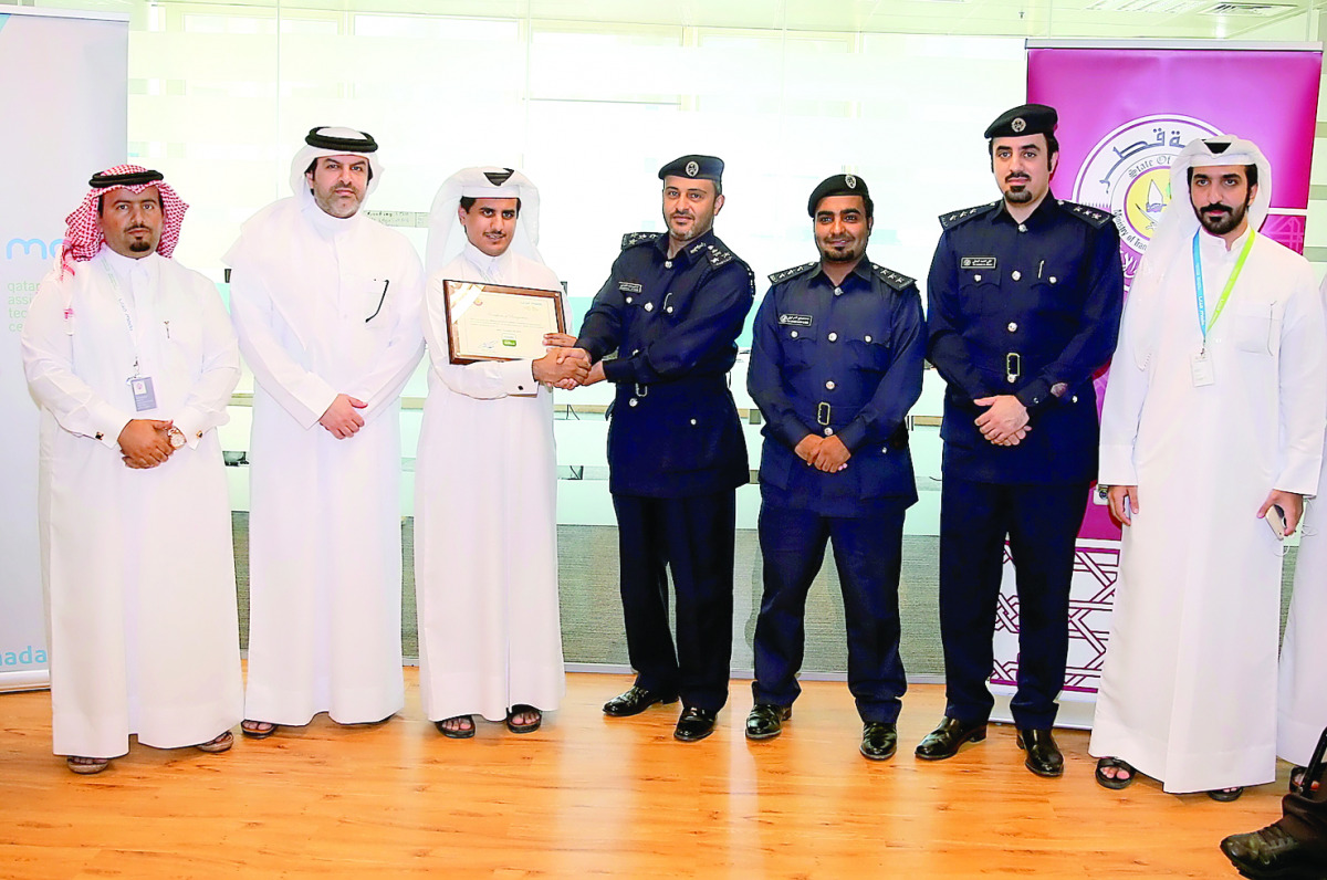 MOI officials receiving the award. 