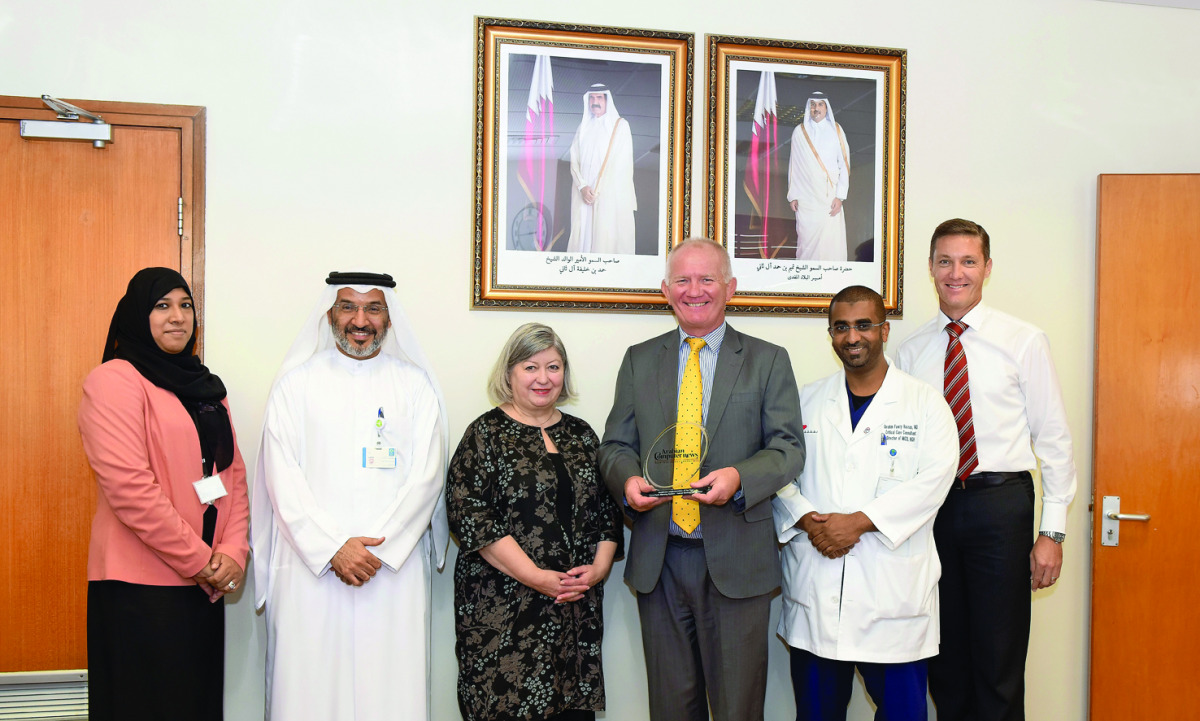 Dr Yousuf Al Maslamani, Medical Director of Hamad General Hospital (second left ) and Professor Mike Richmond, HMC’s Chief Medical Officer (fourth left) with other officials after receiving the ‘Healthcare Implementation of the Year’ award.