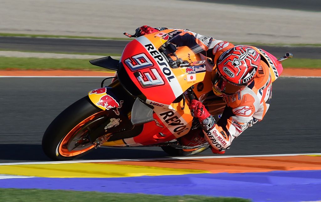 Repsol Honda's Spanish rider Marc Marquez rides during the Moto GP third Free practice session ahead of the Motul Comunidad Valenciana Grand Prix at the Ricardo Tormo racetrack in Cheste, on November 12, 2016. / AFP / JOSE JORDAN
