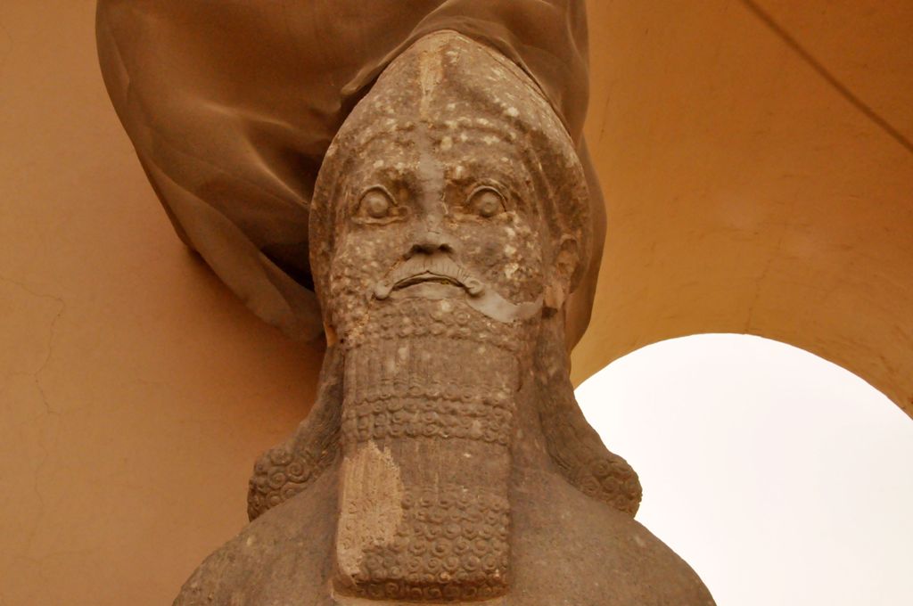 (FILES) This file photo taken on April 09, 2013 shows a partial view of an ancient statue dated from the Assyrian civilization, at the archaeological site of Nimrud that lies on the Tigris River around 30 kilometres (18 miles) southeast of Mosul, Iraq's s