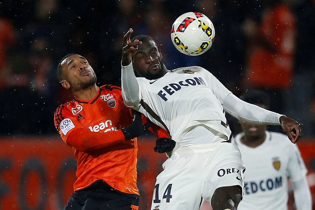 Lorient's Sylvain Marveaux (L) in action with Monaco's Tiemoue Bakayoko. REUTERS/Stephane Mahe

