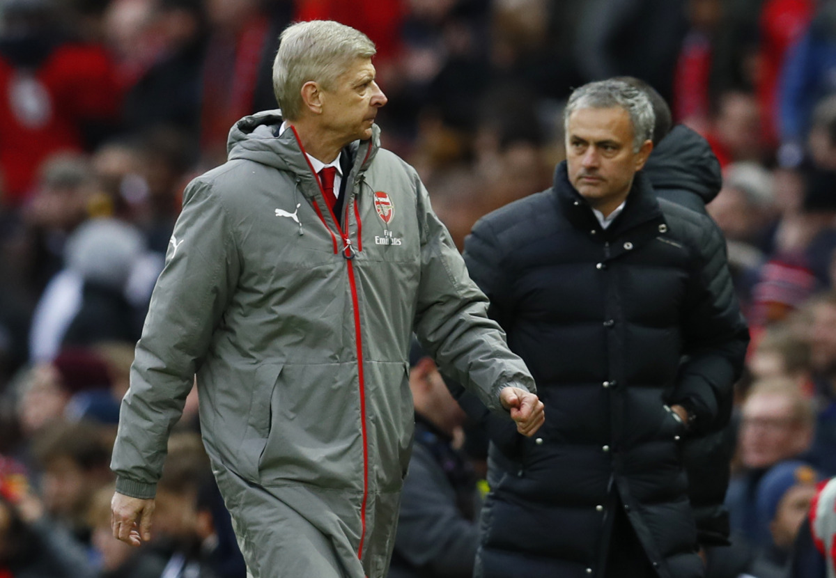 Arsenal manager Arsene Wenger and Manchester United manager Jose Mourinho at the end of the match. (Reuters / Jason Cairnduff)