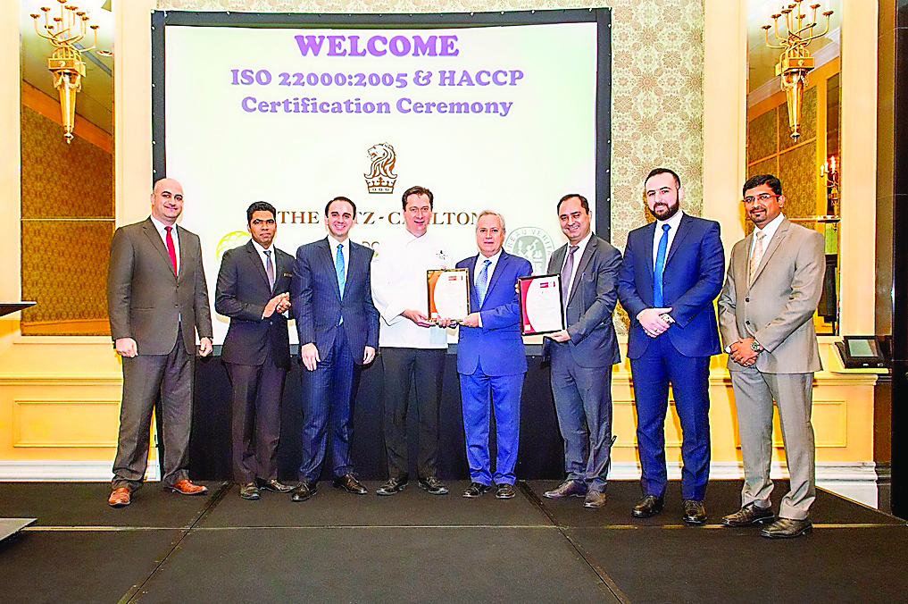 The Ritz-Carlton Doha management team with the ISO 22000 and HACCP certifications.