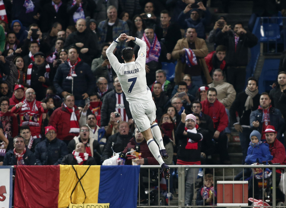  Cristiano Ronaldo of Real Madrid celebrates after scoring a goal during the La Liga match between Club Atletico de Madrid and Real Madrid CF at Vicente Calderon Stadium on November 19, 2016 in Madrid, Spain. ( Burak Akbulut - Anadolu Agency )