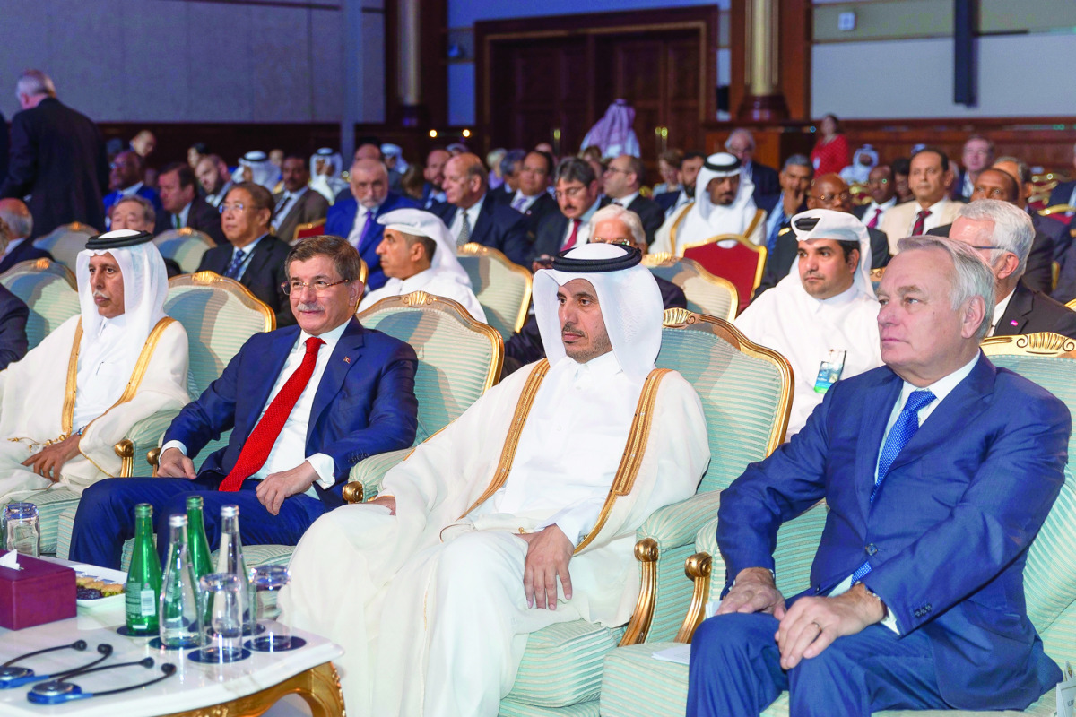 Prime Minister and Interior Minister H E Sheikh Abdullah bin Nasser bin Khalifa Al Thani, and Deputy Prime Minister and Minister of State for Cabinet Affairs H E Ahmed bin Abdullah bin Zaid Al Mahmoud at the World Policy Conference in Doha yesterday. 