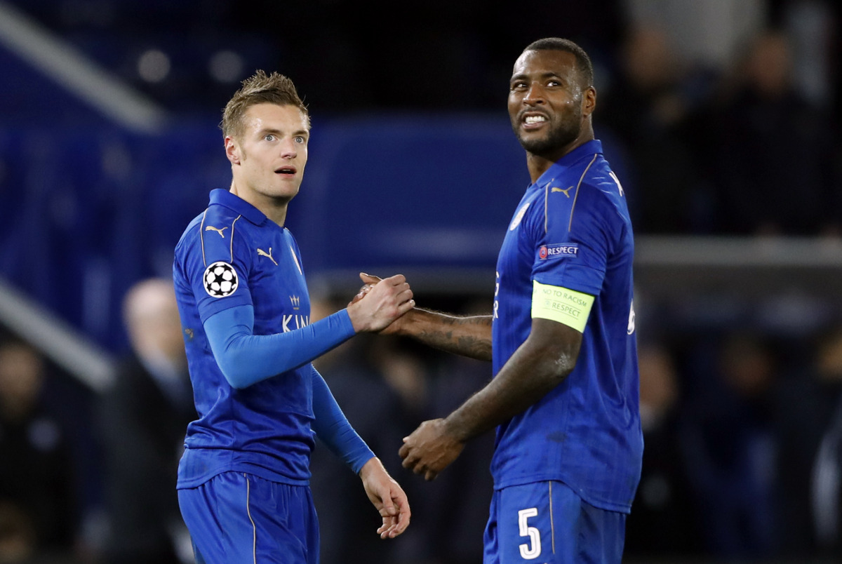  Leicester City's Jamie Vardy and Wes Morgan (R) shake hands as they celebrate at full time. (Reuters / Carl Recine Livepic)