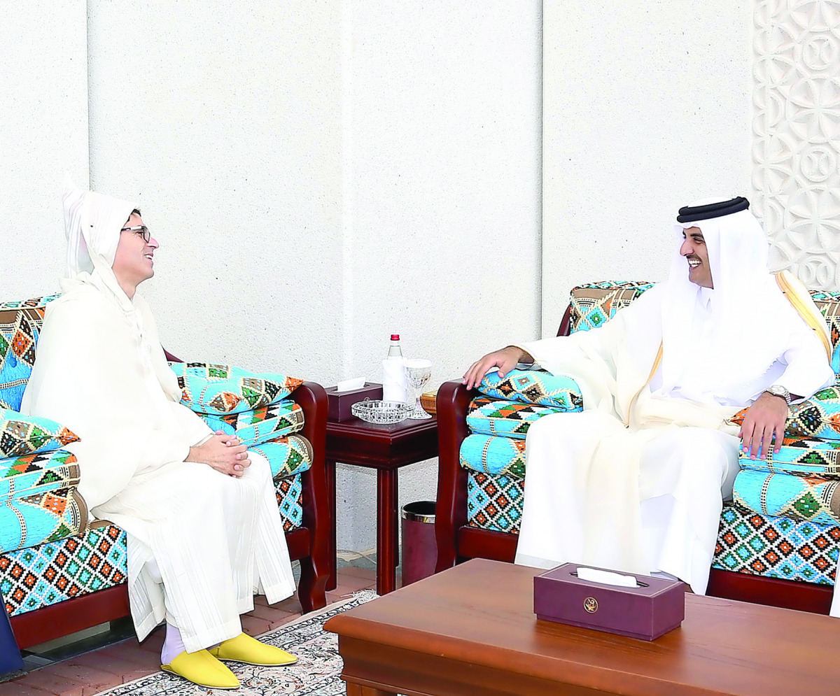 Emir H H Sheikh Tamim bin Hamad Al Thani with the new Ambassador of the Kingdom of Morocco Nabil Zniber (left) and  Ambassador of Singapore, Jai Sohan Singh, at the Emiri Diwan, yesterday.