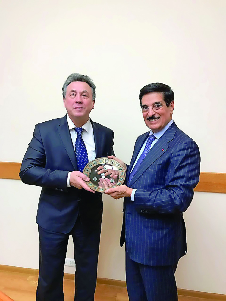 H E Dr Hamad bin Abdulaziz Al Kawari with a senior Russian official in Moscow.