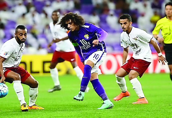 Al Ain's Omar Abdulrahman (centre) in action against Qatar’s El Jaish at the AFC Champions League Group D match in this file photo of  February 25, 2016.