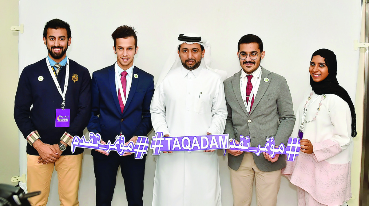 Dr Hassan Al Derham, President of Qatar University, and other participants at the Taqadam conference in Doha yesterday.