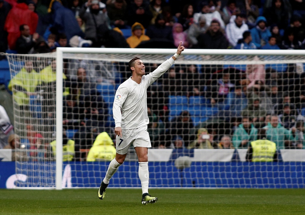 Cristiano Ronaldo of Real Madrid celebrates scoring a goal during the La Liga football match between Real Madrid and Real Sporting de Gijon at Santiago Bernabeu Stadium in Madrid, Spain on November 26, 2016. ( Burak Akbulut - Anadolu Agency )