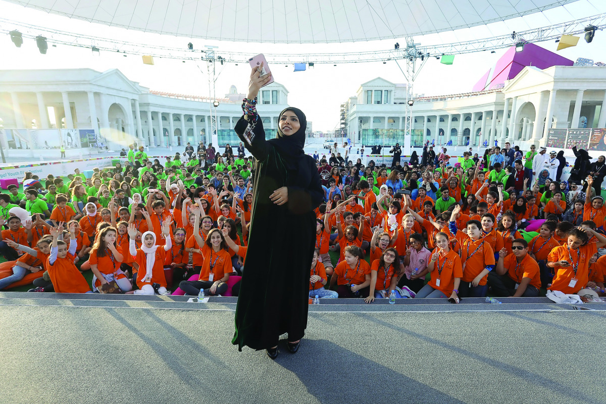 CEO of Doha Film Institute Fatma Al Remaihi takes a selfie with members of the jury the Ajyal Youth Film Festival in Doha, yesterday. 