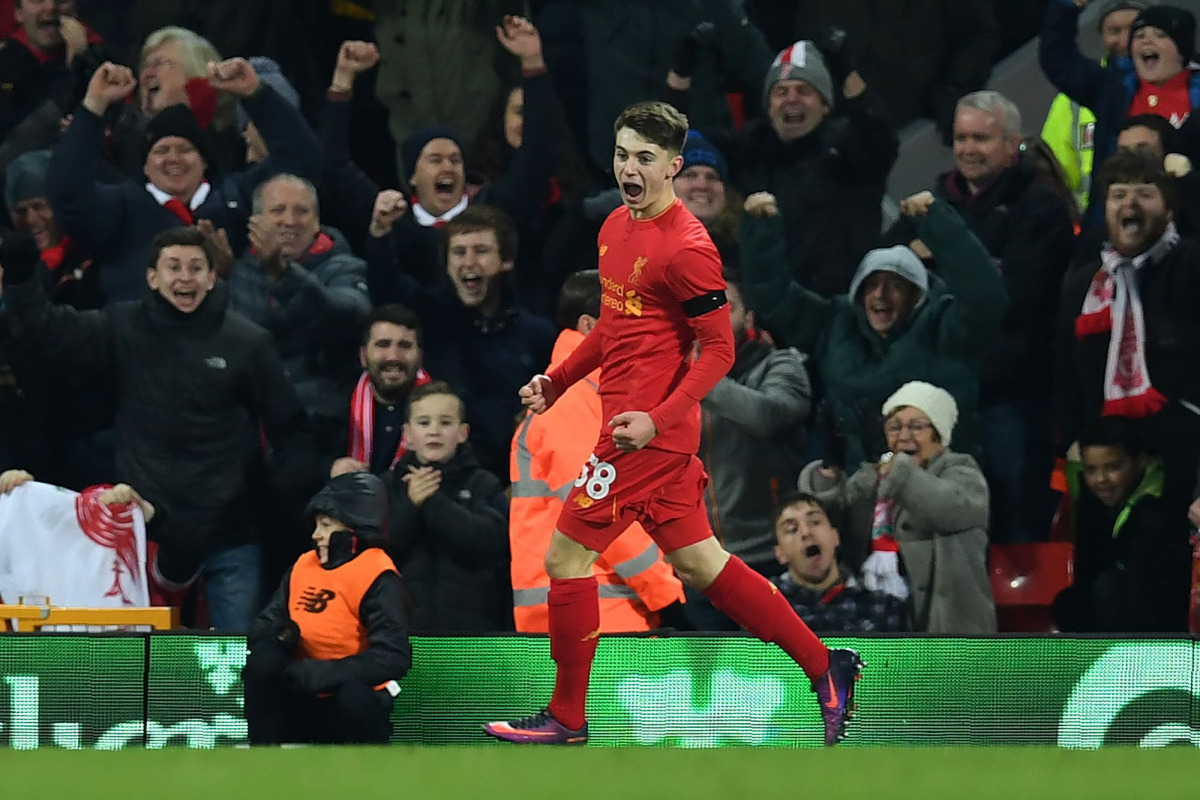 Liverpool's Welsh striker Ben Woodburn celebrates scoring his team's second goal during the English League Cup quarter-final football match between Liverpool and Leeds United at Anfield in Liverpool, north west England on November 29, 2016. Liverpool won 