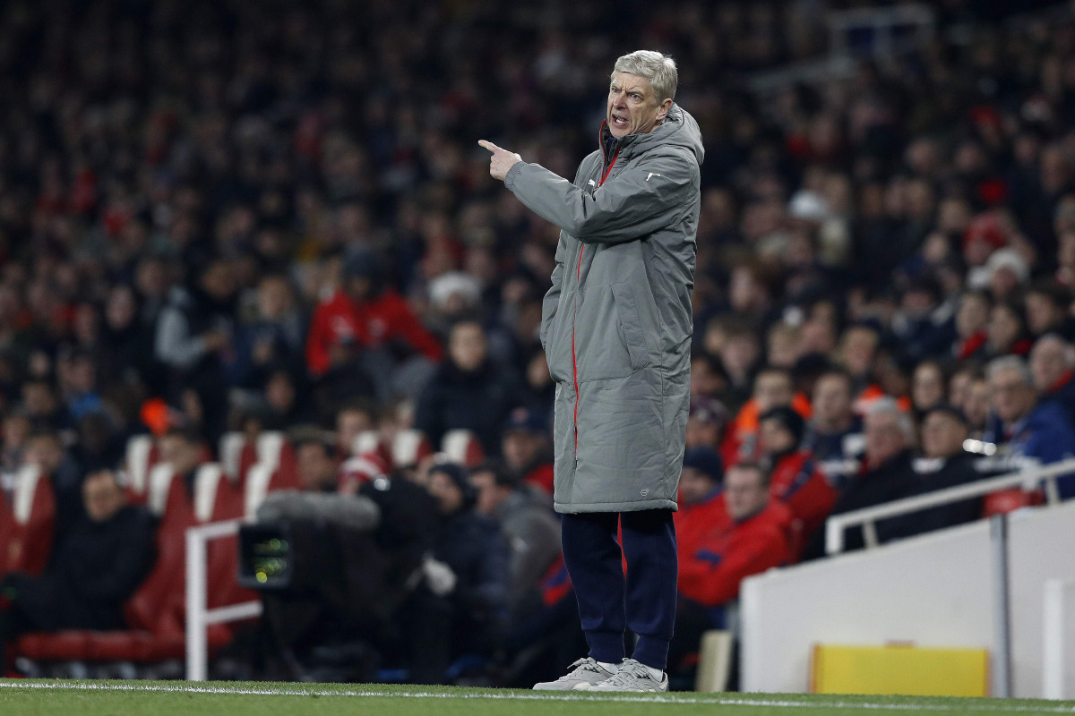 Arsenal's French manager Arsene Wenger shouts instructions to his players from the touchline during the EFL (English Football League) Cup quarter-final football match between Arsenal and Southampton at the Emirates Stadium in London on November 30, 2016. 