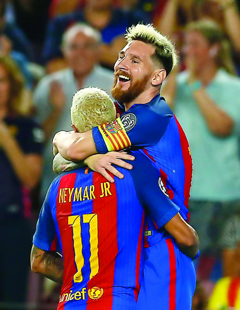 Barcelona’s Lionel Messi (right) celebrates with Neymar after scoring a goal during their UEFA Champions League match against Celtic in  Barcelona, Spain, in this file Photo.