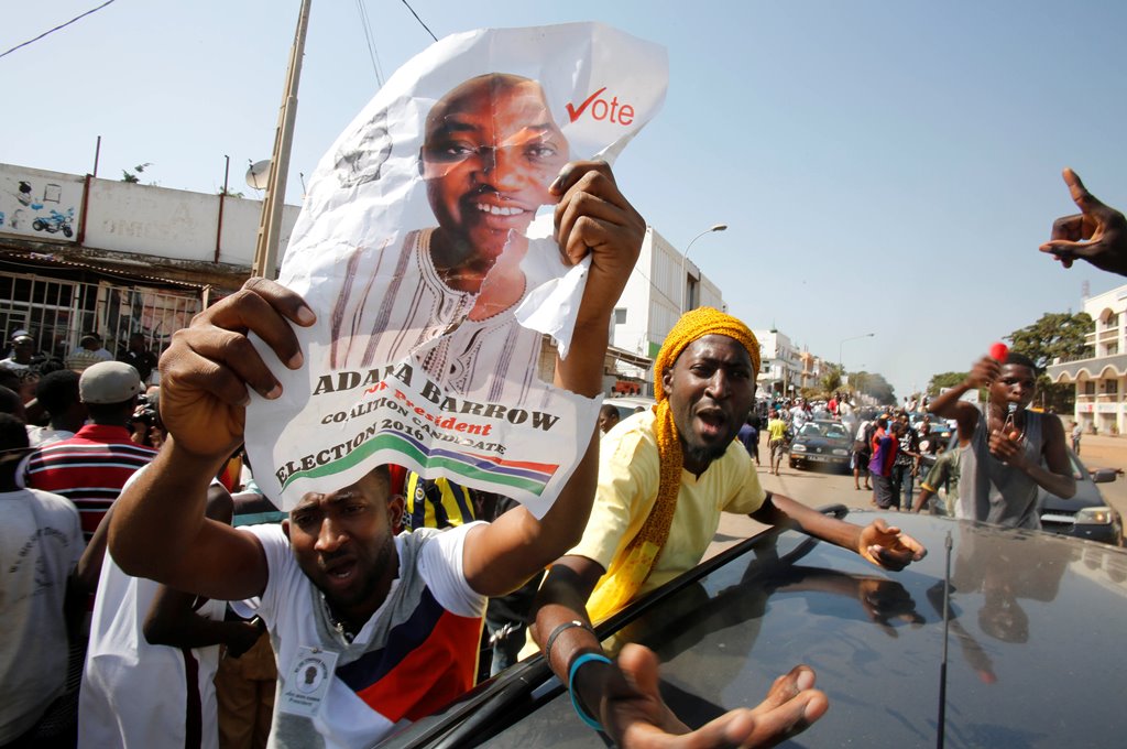 Supporters of president-elect Adama Barrow celebrate Barrow's election victory in Banjul, Gambia, December 2, 2016. REUTERS/Thierry Gouegnon
