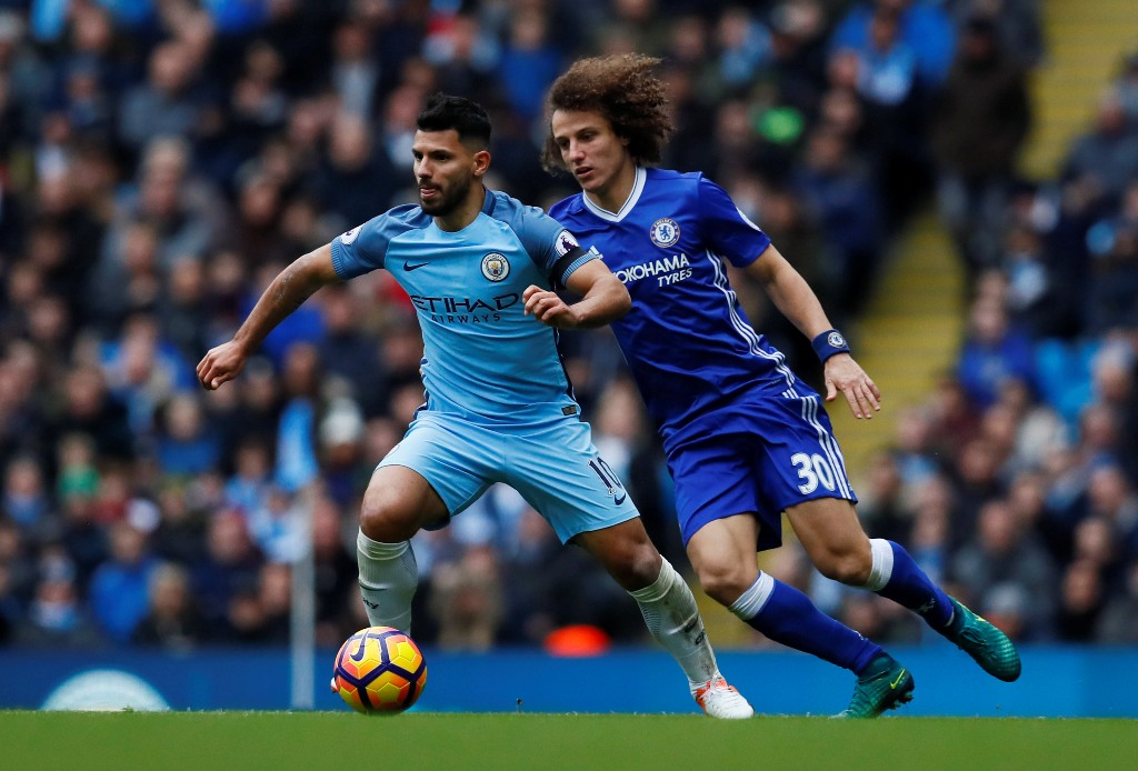 Manchester City's Sergio Aguero in action with Chelsea's David Luiz. Reuters / Jason Cairnduff 
