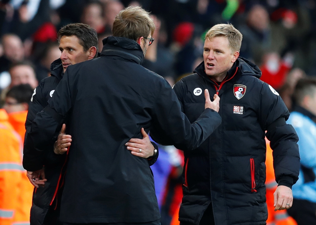 Bournemouth manager Eddie Howe and assistant Jason Tindall shake hands with Liverpool manager Juergen Klopp after the game Reuters / Eddie Keogh  
