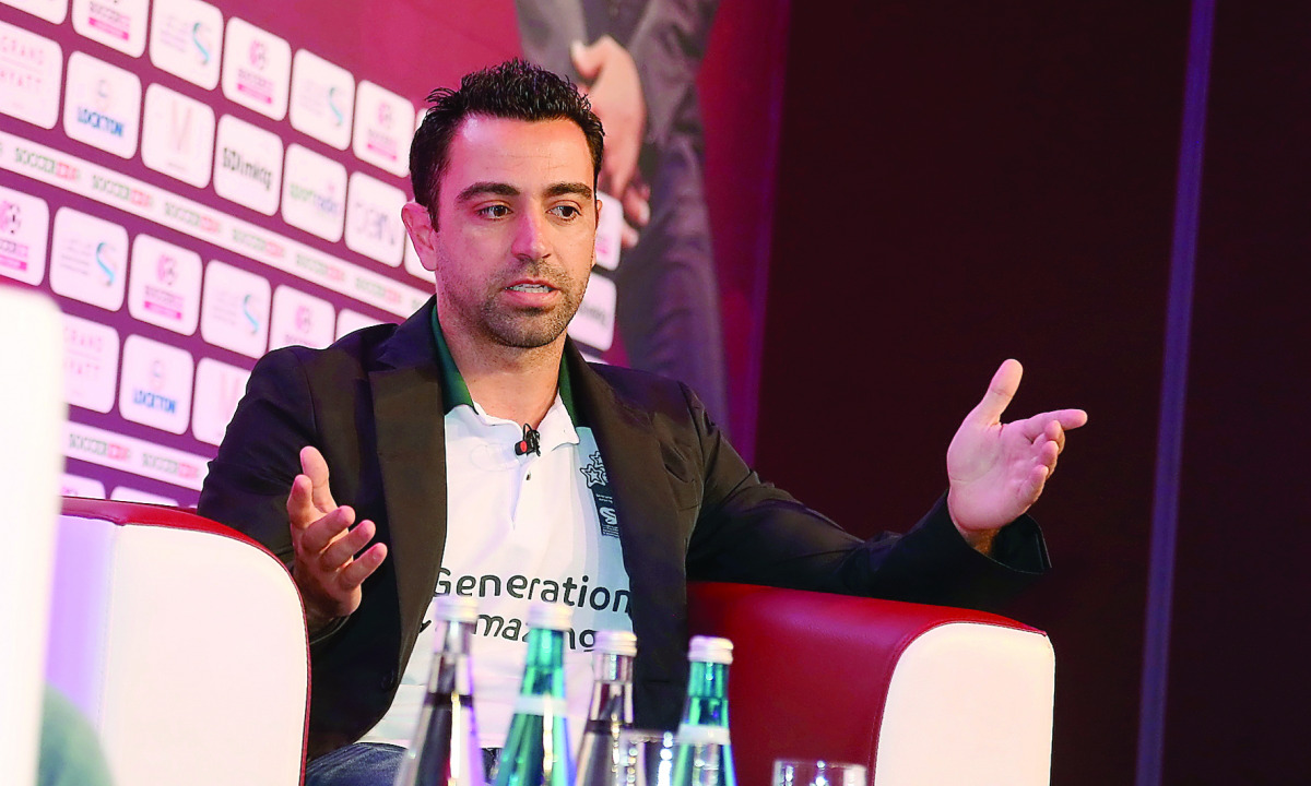 Barcelona legend Xavi Hernandez speaks during the Soccerex Asian Forum in Doha yesterday.