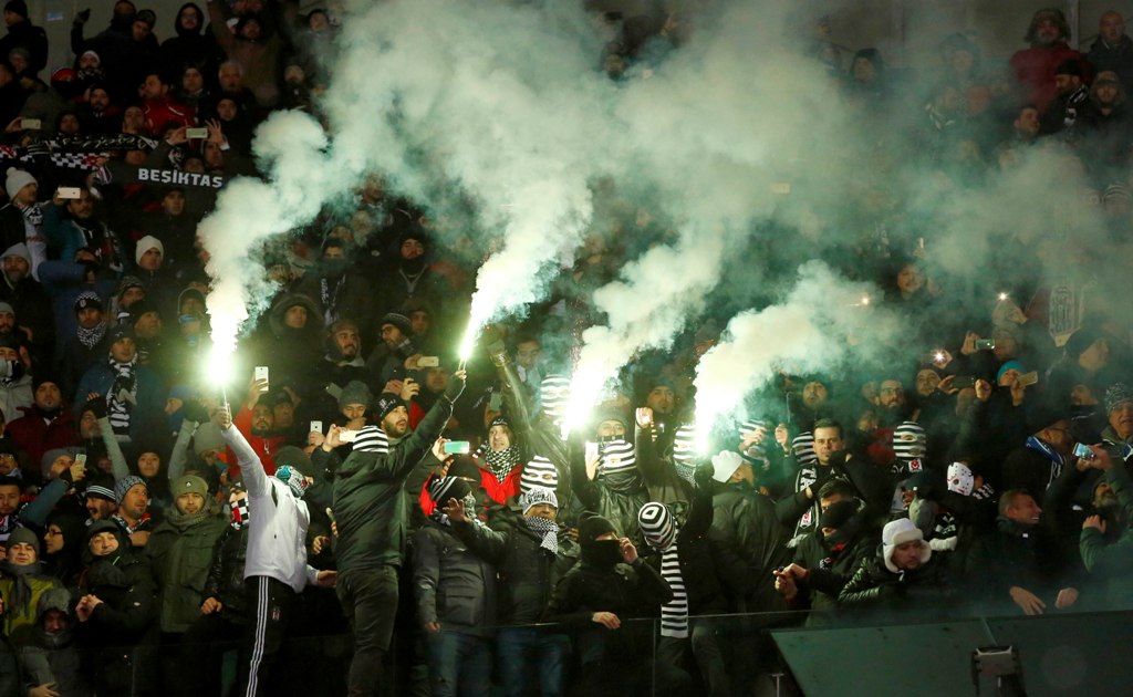 Players of Besiktas JK support their team during the UEFA Champions League football match between FC Dynamo Kiev and Besiktas JK at the Olympiyski Stadium in Kiev, Ukraine on December 6, 2016. ( Bülent Doruk - Anadolu Agency )
