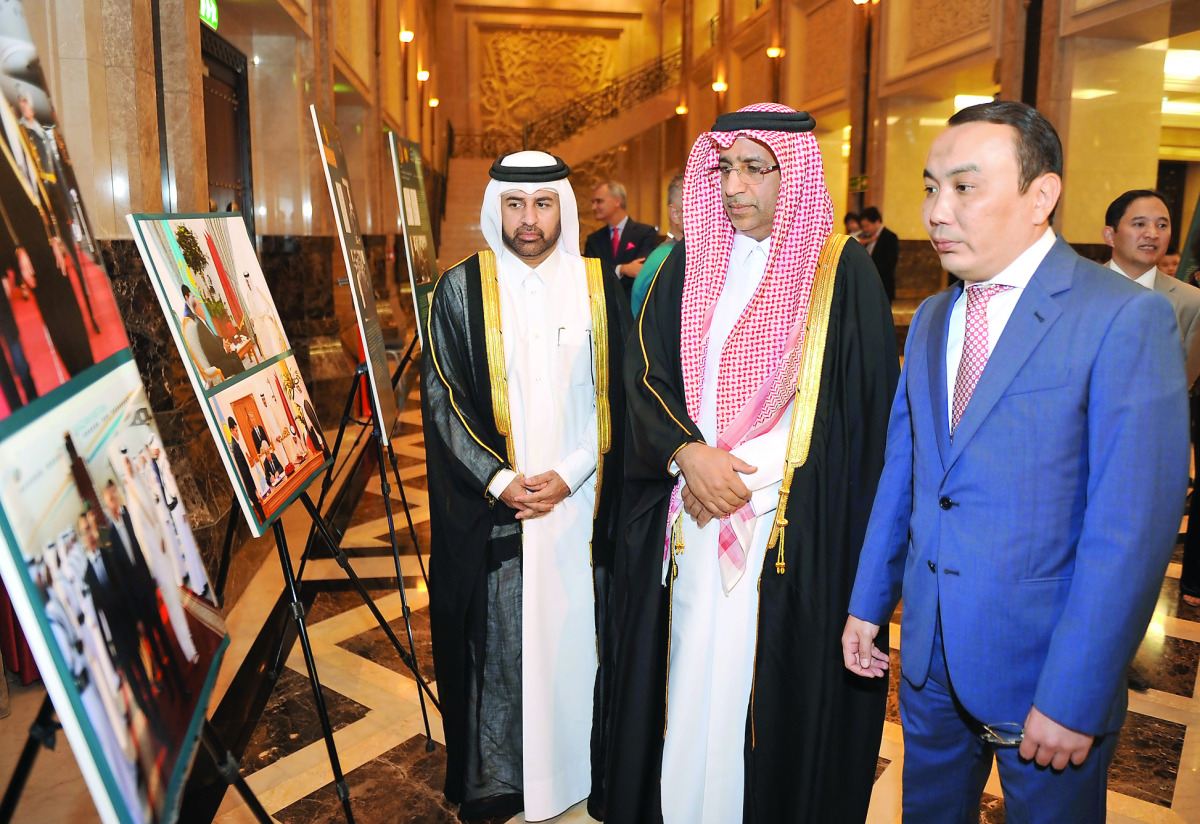 Minister of Justice H E Dr Hassan Lahdan Saqr Al-Mohannadi (centre); Khalid bin Ibrahim Al Sulaiti (left) General Manager of Katara; with Ambassador of Kazakhstan to Qatar Askar Shokybayev visited the photography exhibition to mark 25th anniversary of Kaz