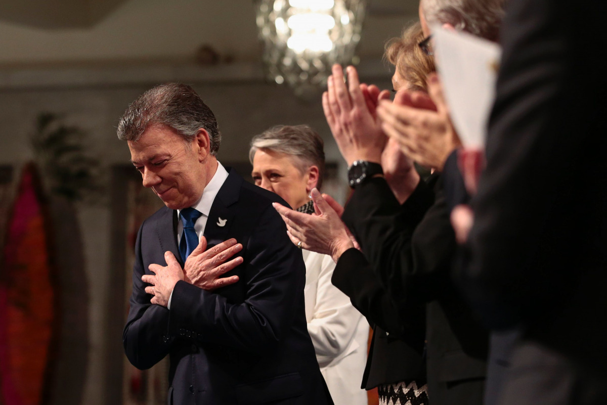 Nobel Peace Prize laureate Colombian President Juan Manuel Santos is applauded during the Nobel Peace Prize award ceremony at the City Hall in Oslo on December 10, 2016. Colombian President Juan Manuel Santos was awarded this year's Nobel Peace Prize for 