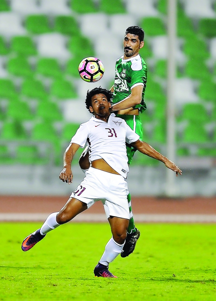 El Jaish's Romarinho (front) vies for the ball pocession with Al Ahli player during a Qatar Stars League match played at Al Ahli Stadium in this file photo. 