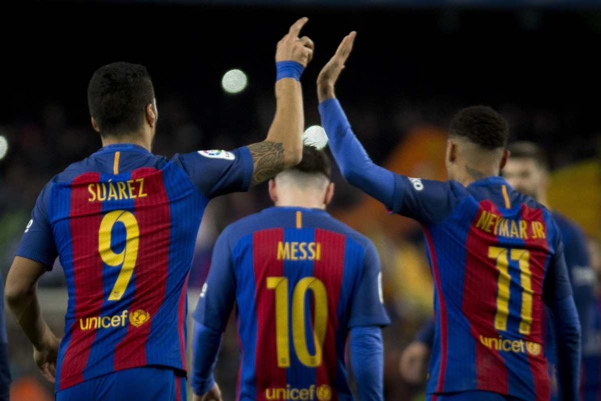 Luis Suarez, Leo Messi and Neymar Jr of Barcelona celebrate scoring a goal during the La Liga soccer match between FC Barcelona and RCD Espanyol at Camp Nou Stadium in Barcelona, Spain on December 18, 2016. ( Albert Llop - Anadolu Agency )