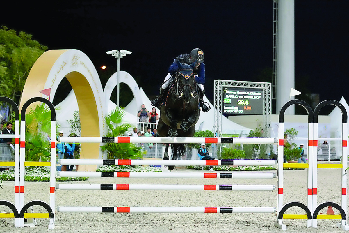 Saudi rider Ramzy Hamad Al Duhami, winner of top prize, in action astride Garlic VH Kapelhof during the opening day of  Qatar International Show Jumping Championship in Doha, Yesterday.  
