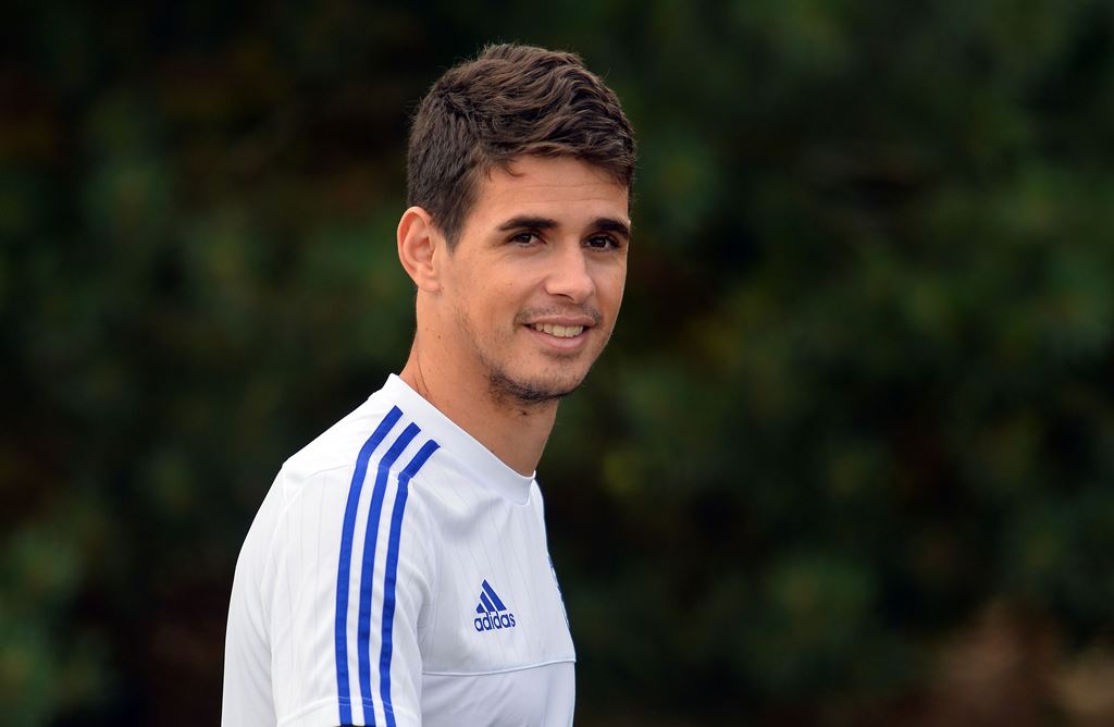 (FILES) This file photo taken on July 31, 2015 shows Chelsea's Oscar attending a team training session at Chelsea's training ground in Stoke D'Abernon, south of London. AFP / Glyn KIRK 
