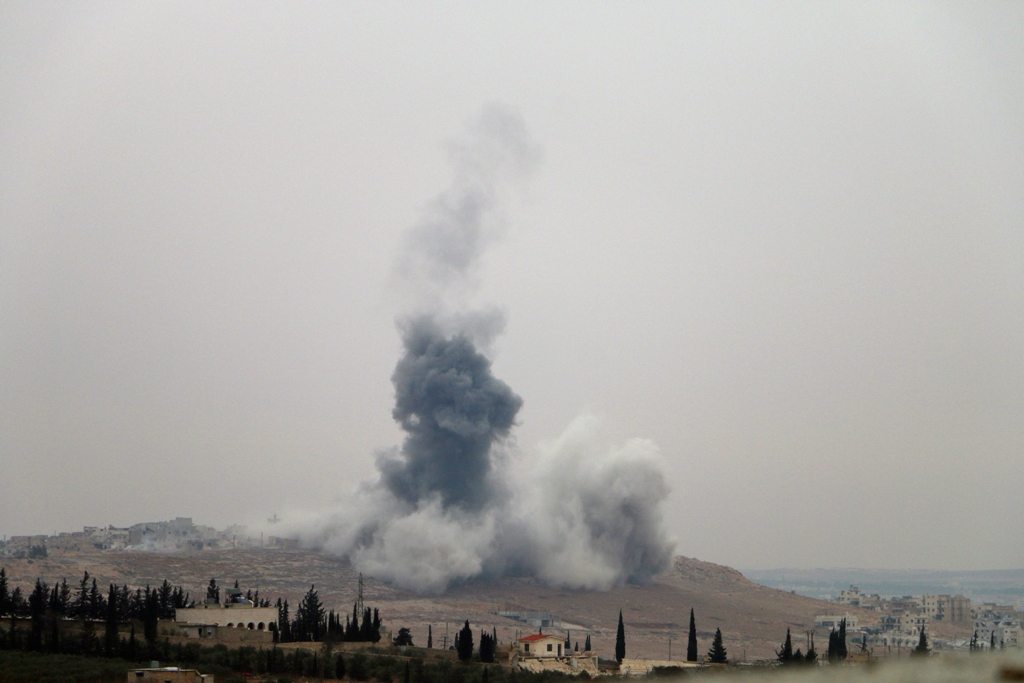 moke rises after Turkish Army's airstrike over Daesh terrorists' positions as Free Syrian Army move forward to the center of al-Bab district during the 