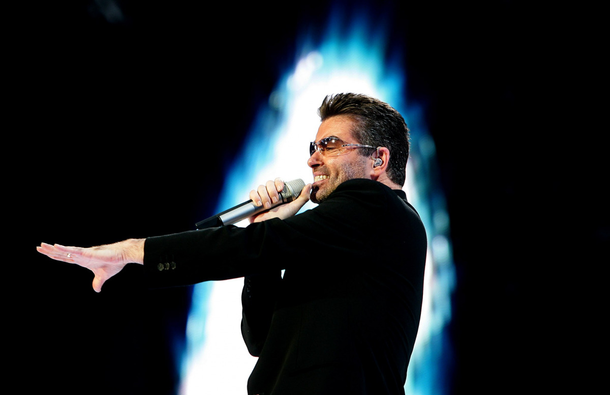 This file photo taken on June 26, 2007 shows British singer George Michael performing during a concert in Amsterdam. Michael, who rose to fame with the band Wham! and sold more than 100 million albums in his career, has died aged 53, his publicist said on