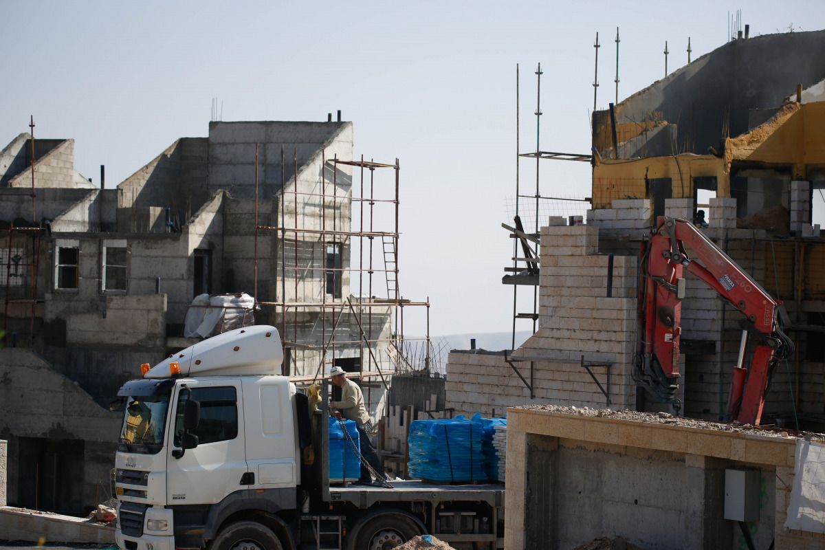 Israeli settlements, under construction are seen, in Palestinian lands in Jerusalem, on December 29, 2016. Settlement constructions by Israel continue in Ramat Shlomo, a Jewish settlement located in east of Jerusalem. However, UN Security Council adopted 