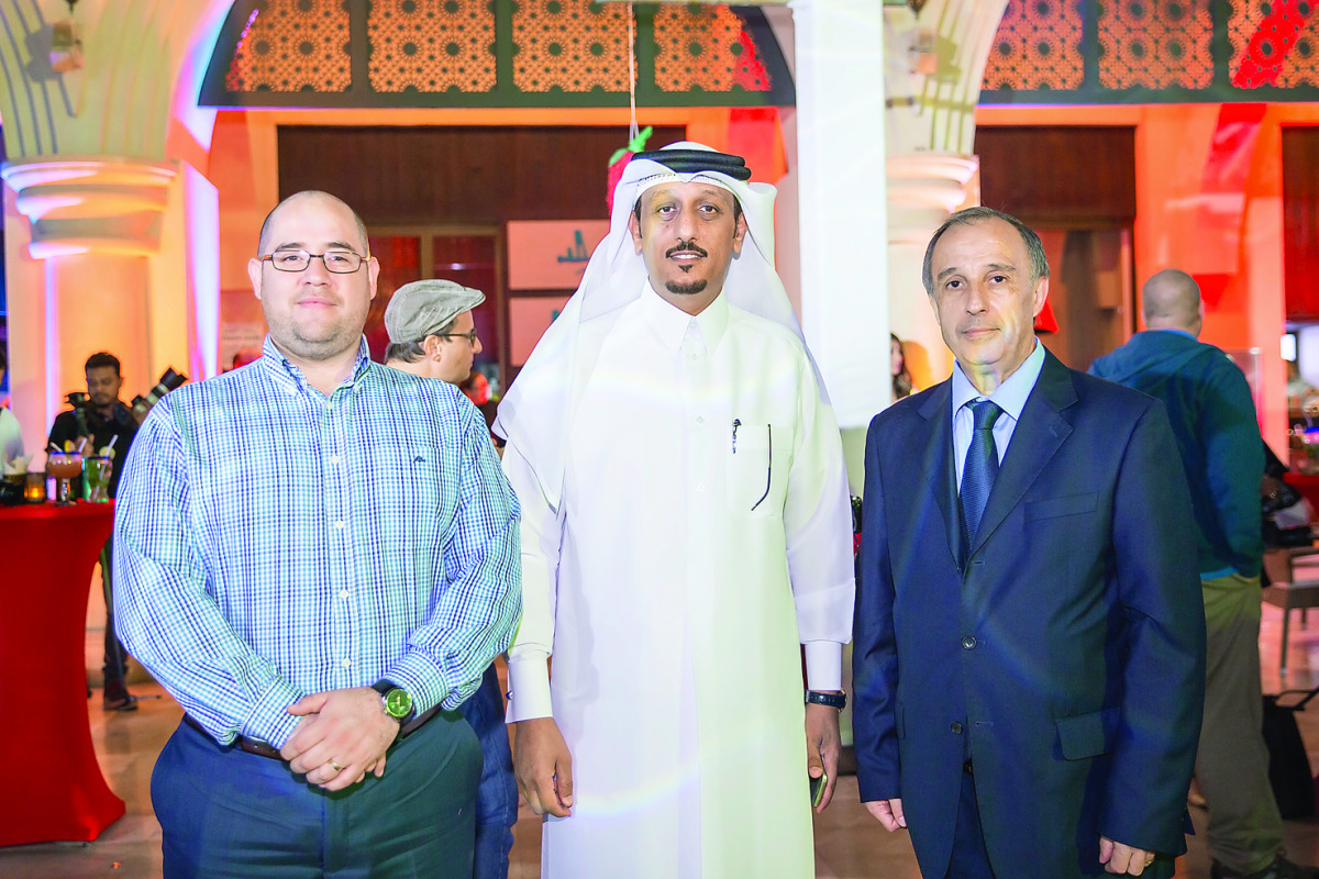 Abdullatif Al-Yafei, Executive Director of Portfolios Investment in United Development Company (centre), Ambassador of the Republic of Uruguay to Qatar (right) and ,the First Secretary of the Republic of Paraguay in Qatar, in a group photo at Isla opening