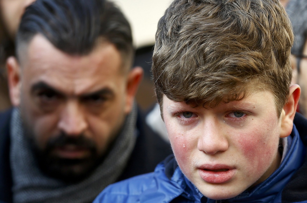 A boy cries at the funeral of Ayhan Arik a victim of an attack by a gunman at Reina nightclub in Istanbul, Turkey, January 1, 2017 (REUTERS / Osman Orsal) 