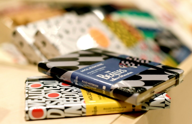 Notebooks of Italian notebook manufacturer Moleskine are laid out for sale in a store in central Rome on December 20, 2016. The Italian group’s sales have more than tripled in the last seven years. AFP
