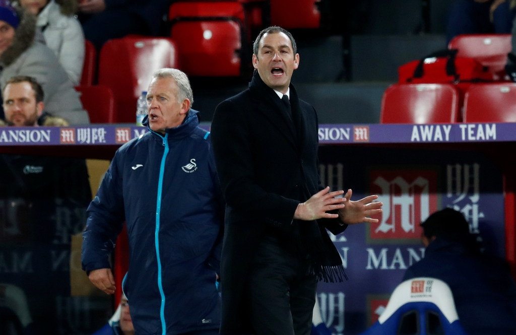 New Swansea City manager Paul Clement and caretaker manager Alan Curtis (L) Reuters / Eddie Keogh 
