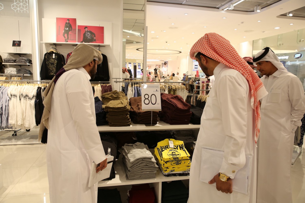 Ministry officials inspect the products for misleading offers at various malls during Shop Qatar Festival 