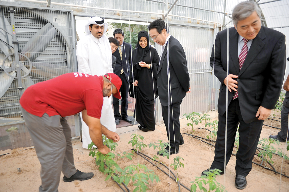 Amal Al Mannai, CEO of Qatar Foundation for Social Activities and Acting Executive Director of Shafallah (third right) with Yasuo Yokota, Managing Director of Mitsubishi (second right) and Seiichi Otsuka Ambassador of Japan (right) at the launch of Green 