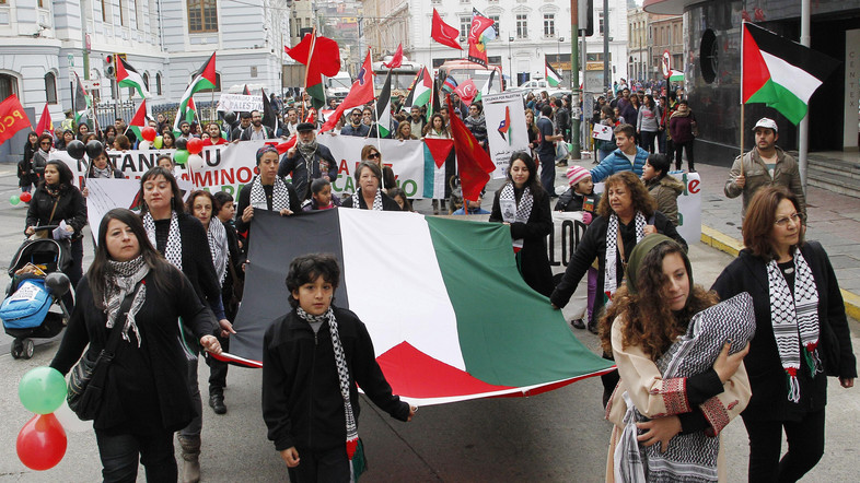File photo of Members of the Palestine community in Chile hold up a Palestine flag during a rally for peace in Gaza in Valparaiso, northwest of Santiago (Reuters) 