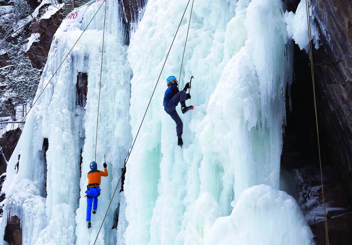 Participants compete in a regional ice climbing and winter rock climbing championship at the 