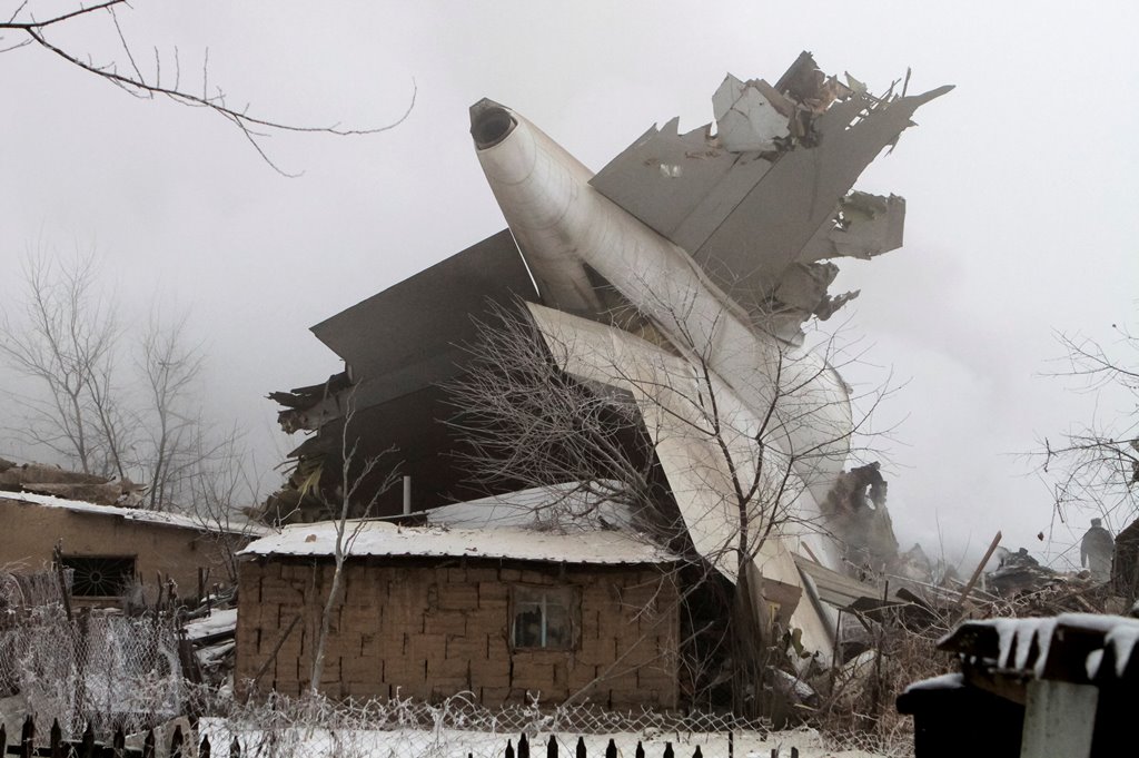 Plane debris is seen at the crash site of a Turkish cargo jet near Kyrgyzstan's Manas airport outside Bishkek, January 16, 2017. REUTERS/Vladimir Pirogov