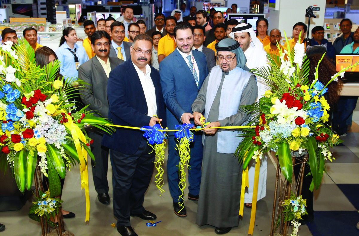 Sharaf DG Owner Sharafauddin Sharaf (right), CEO Nilesh Khalkho (left) and Mall of Qatar General Manager Rony Mourani inaugurating the Sharaf DG Store in Mall of Qatar yesterday. Pic: Qassim Rahmatullah/ The Peninsula