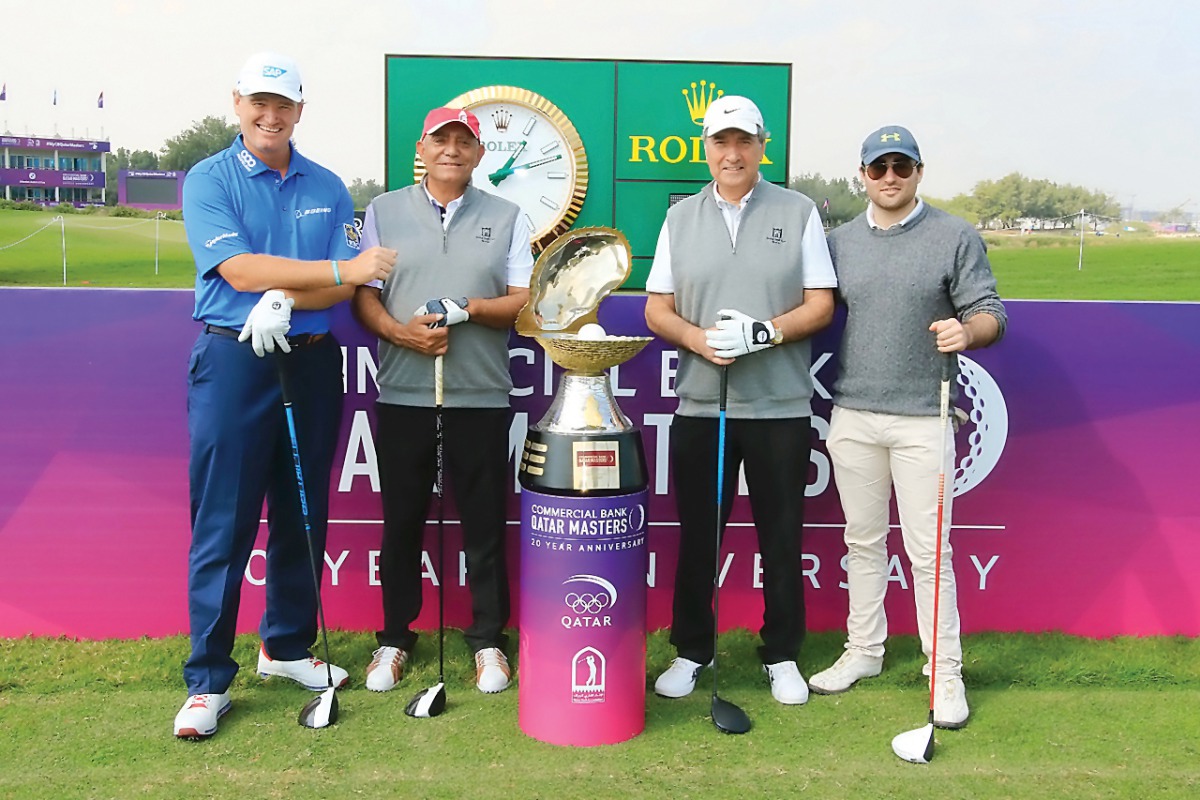 Members of the winning team, Ernie Els, Rachid Aki, Chawki Harb and Matthew Moucharafleh pose for a photograph at the Doha Golf Club yesterday.  
