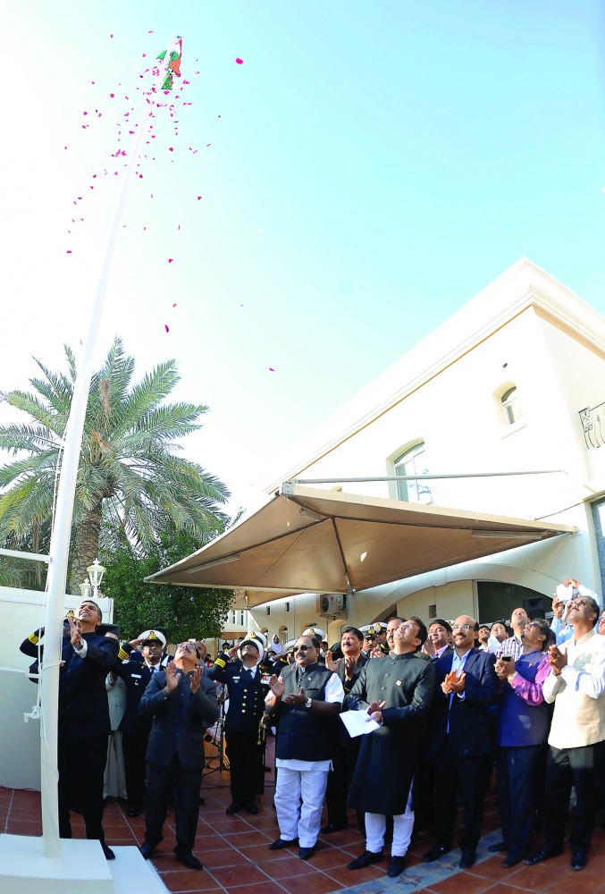 Indian Ambassador P Kumaran hoisting the tricolour to mark the 68th Republic Day celebrations at a function held at the embassy premises in Doha yesterday. Pic: Salim Matramkot / The Peninsula
