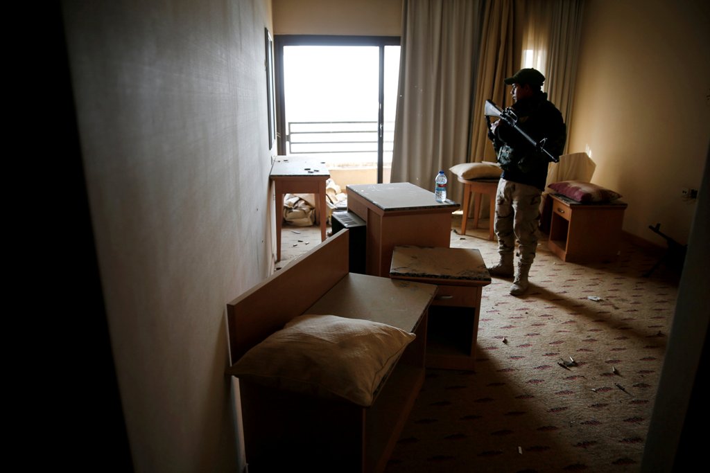 An Iraqi soldier looks at the damages in one of the rooms in the five-star Ninewah Oberoi Hotel in Mosul city, Mosul, Iraq January 30, 2017. Picture taken January 30, 2017. REUTERS/Ahmed Jadallah

