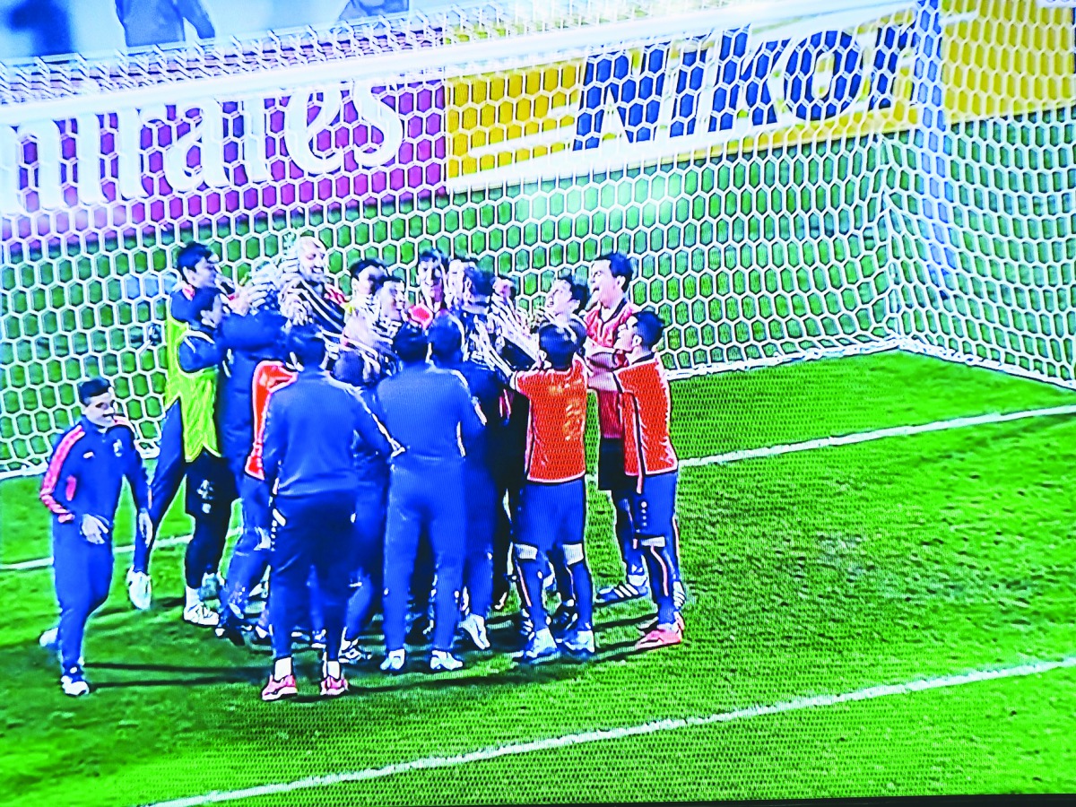 A TV grab of Bunyodkor players celebrating their win over Qatar’s El Jaish in Doha yesterday. The visitors won 3-1 in a penalty shoot-out to book a place in the AFC Champions League Group Stage.