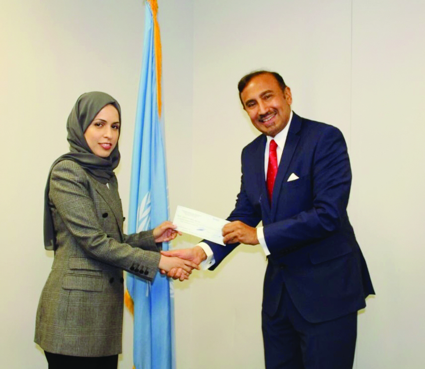 H E Sheikha Alia handing over the cheque to Director of UNCCT  Dr Jehangir Khan.