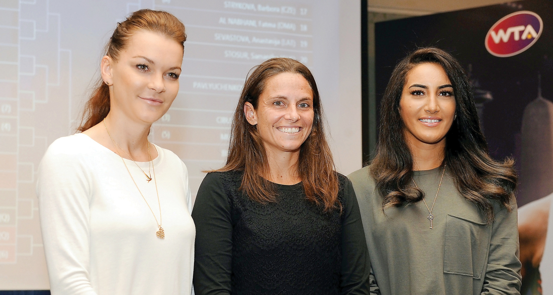 FROM LEFT: Agnieszka Radwanska of Poland, Roberta Vinci of Italy and Fatma Al Nabhani of Oman during the draw ceremony of the Qatar Total Open in Doha yesterday.