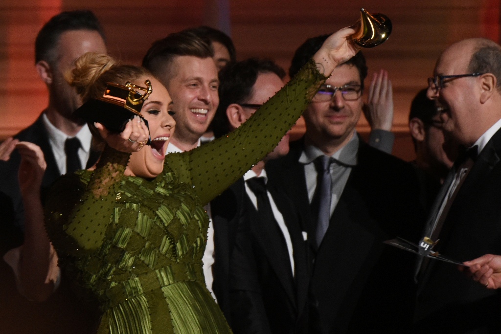 Adele celebrates her Grammys' awards including Best record and Best album of the year performs onstage during the 59th Annual Grammy music Awards on February 12, 2017, in Los Angeles, California. / AFP / VALERIE MACON.